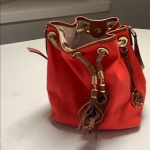MK burnt orange purse
